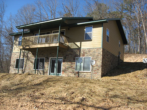 Custom home with cultured stone foundation