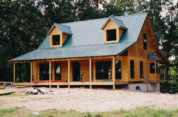 Screw-down metal roofing