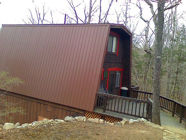 Screw-down metal installed on existing roof