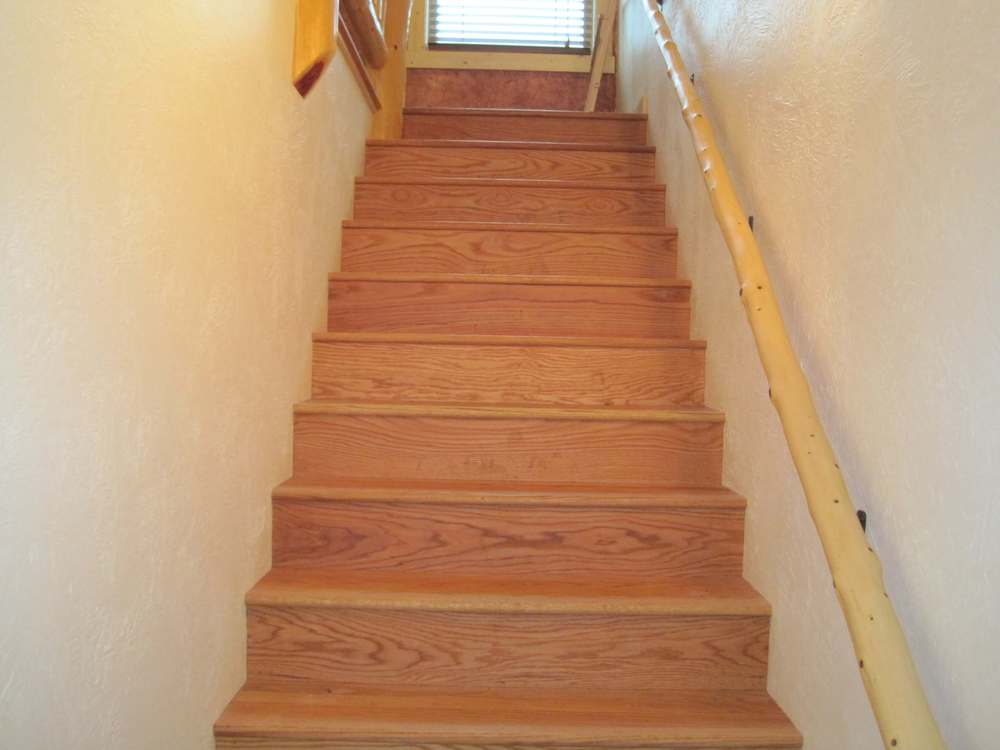 Light-colored wooden stairs inside home